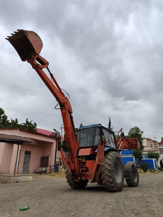 Продается экскаватор погрузчик амкадор