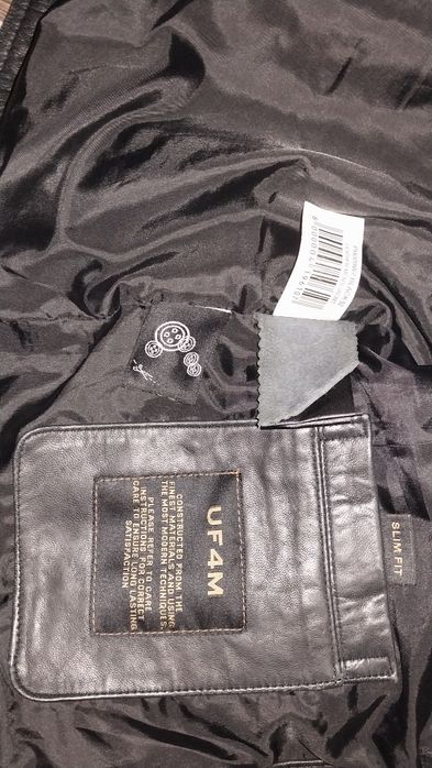 Кожанная куртка чёрного цвета ,косуха от   Снежной Королевы  отличного