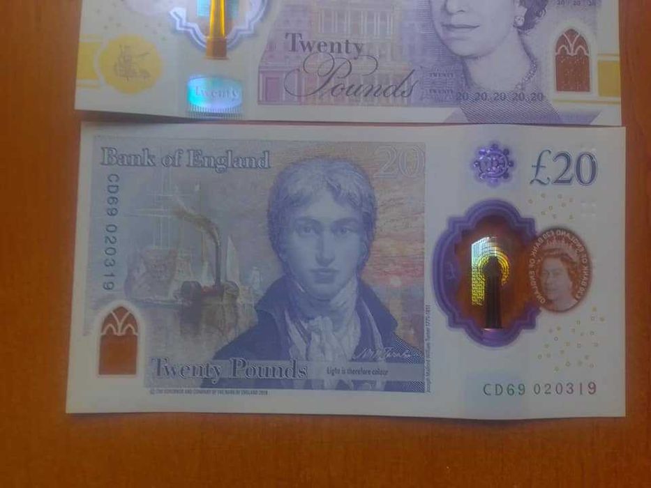 чисто нови банкноти 20 паунда , английски лири  кралица Елизабет