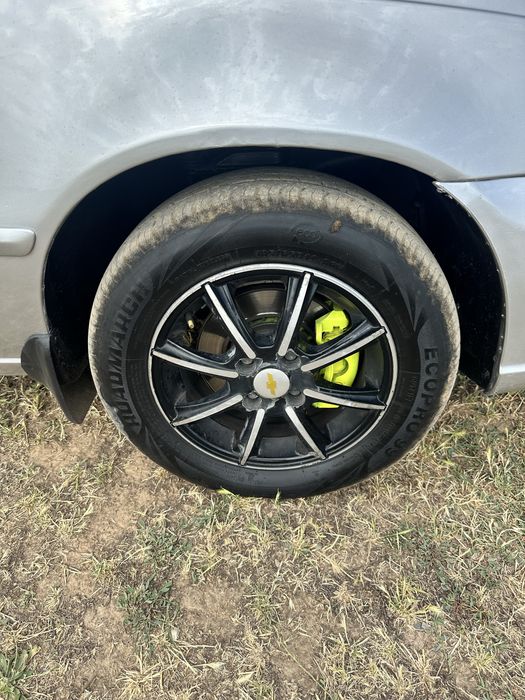 Продам Титановые диски с шинами