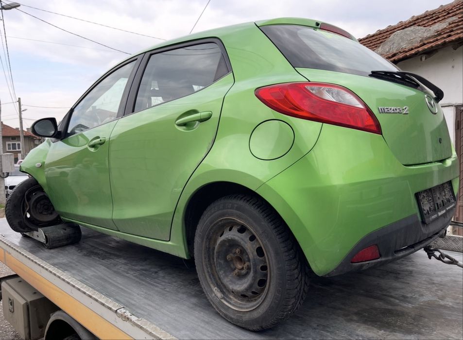 Mazda 2/Мазда 2 на части