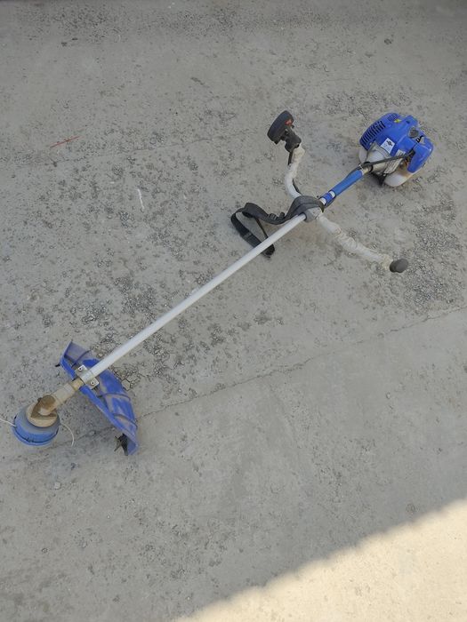 Продам садовый триммер magnat 2400