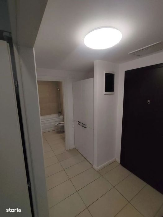 3 camere Cosmopolis-Curte, loc de parcare