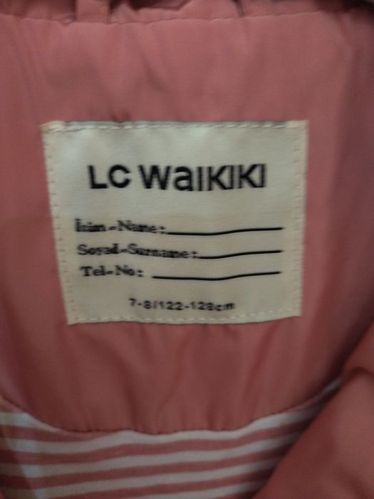 Куртка- плащ на 7 -8  лет .