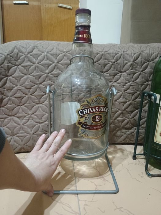 Шишета стъклени на стойка