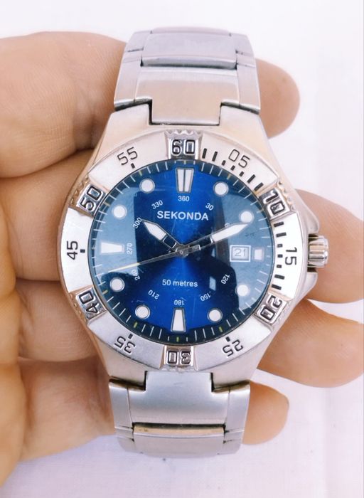 Ceas barbatesc Sekonda, miscare cuart, din otel inoxidabil.