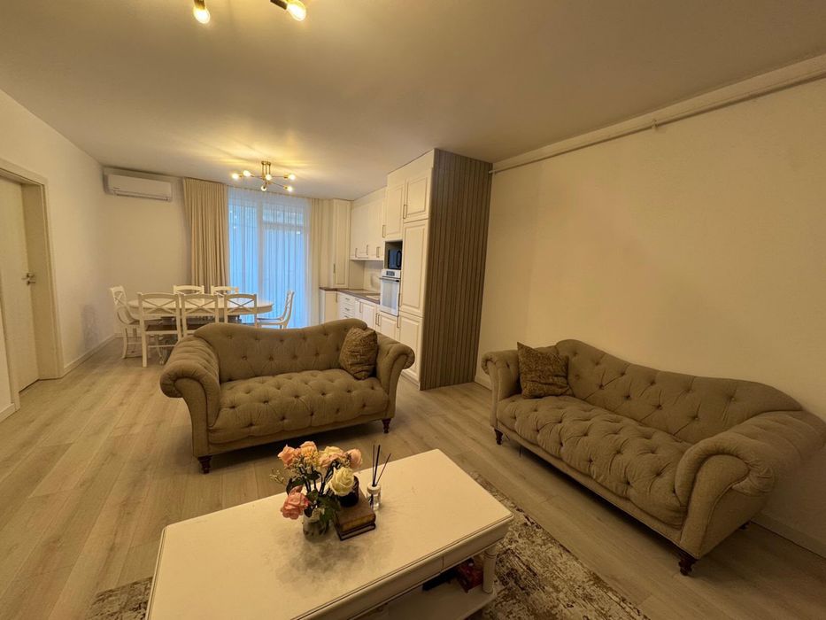 Apartament modern de inchiriat 2 camere, living cu bucatarie si dormitor, 58mp, curte, incalzire pardoseala, AC, dressing