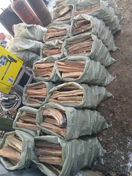 Дрова в мешках. Цена 1500