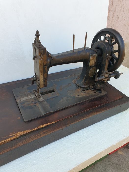 Mașină de cusut Singer