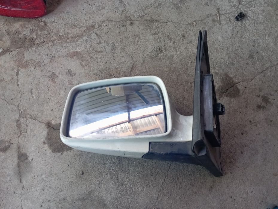 Kia Sportage 2 левое зеркало