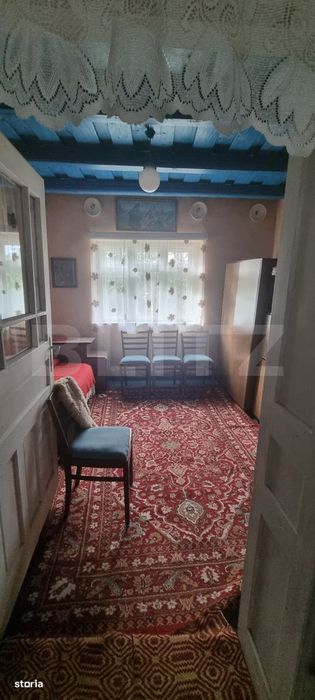 Casa cu doua corpuri