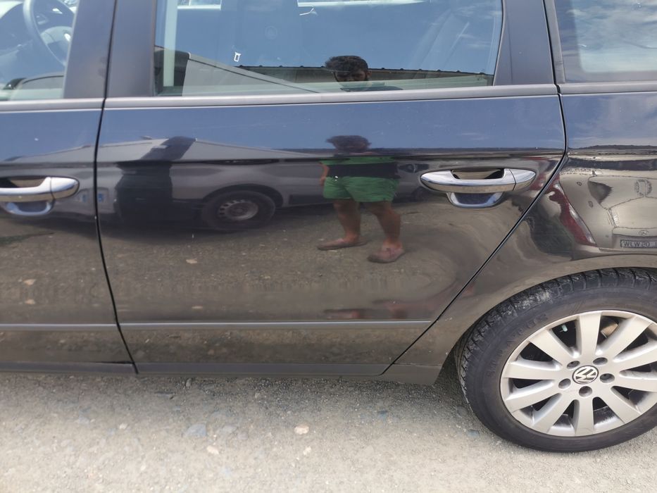 Usa portiera stanga dreapta spate negru metalizat vw Passat b6 2009 fără rugina sau kit