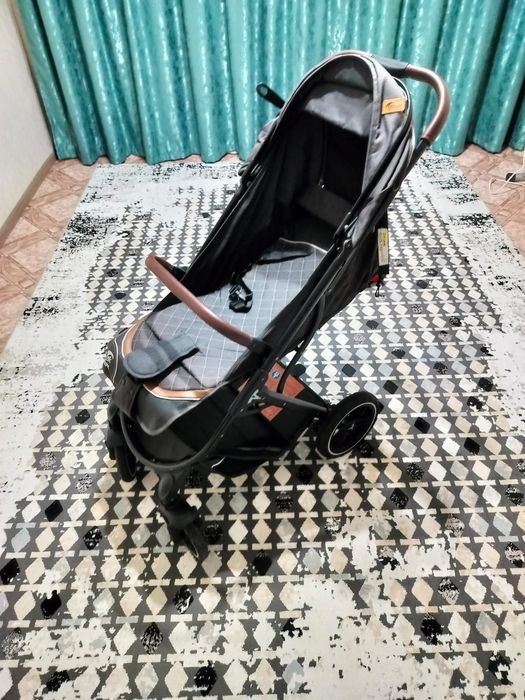 Коляска в идеальном состоянии.