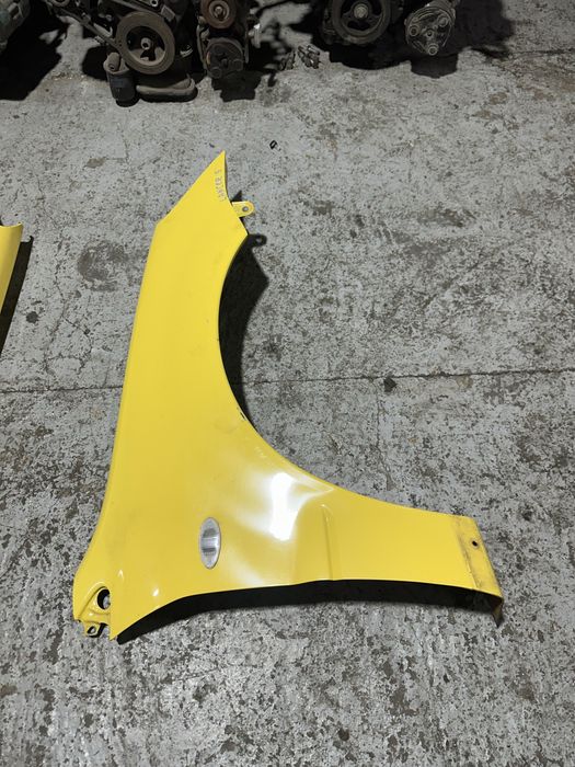 Крылья передние Mitsubishi Lancer 9