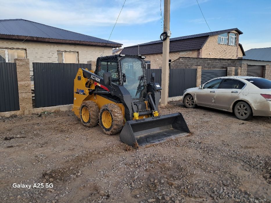 Бобкат, услуги мини погрузчика виллы