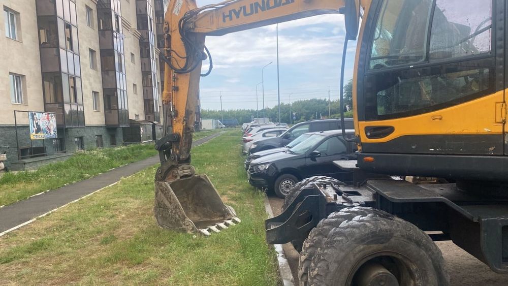 Колесный экскаватор