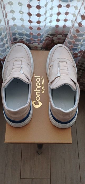 Продам кожаные кроссовки Conhpol