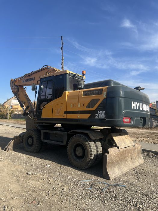 Колесный Эксковатор HW 210