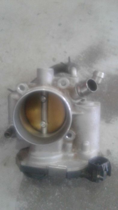 дроселний заслонка трекер 1  Орландо 1.8л