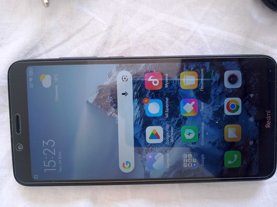 Смартфон Redmi 7a включено зарядно