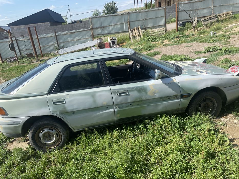 Срочно! Mazda 323