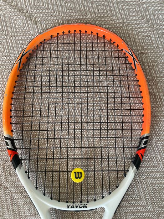 Теннисная ракетка