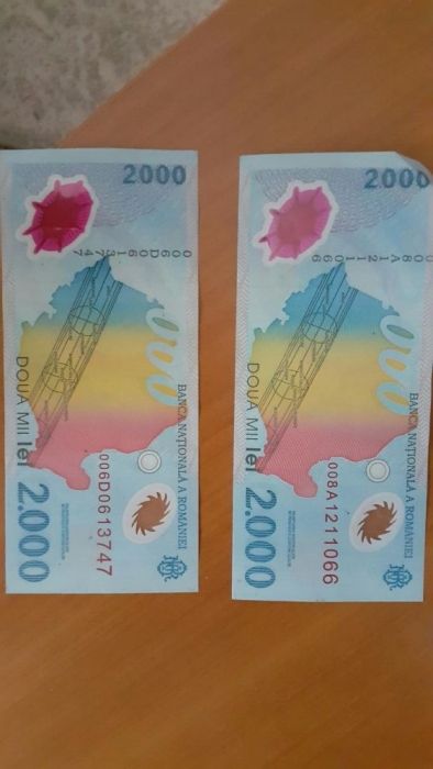 Vand bancnote de 2.000 lei cu eclipsa