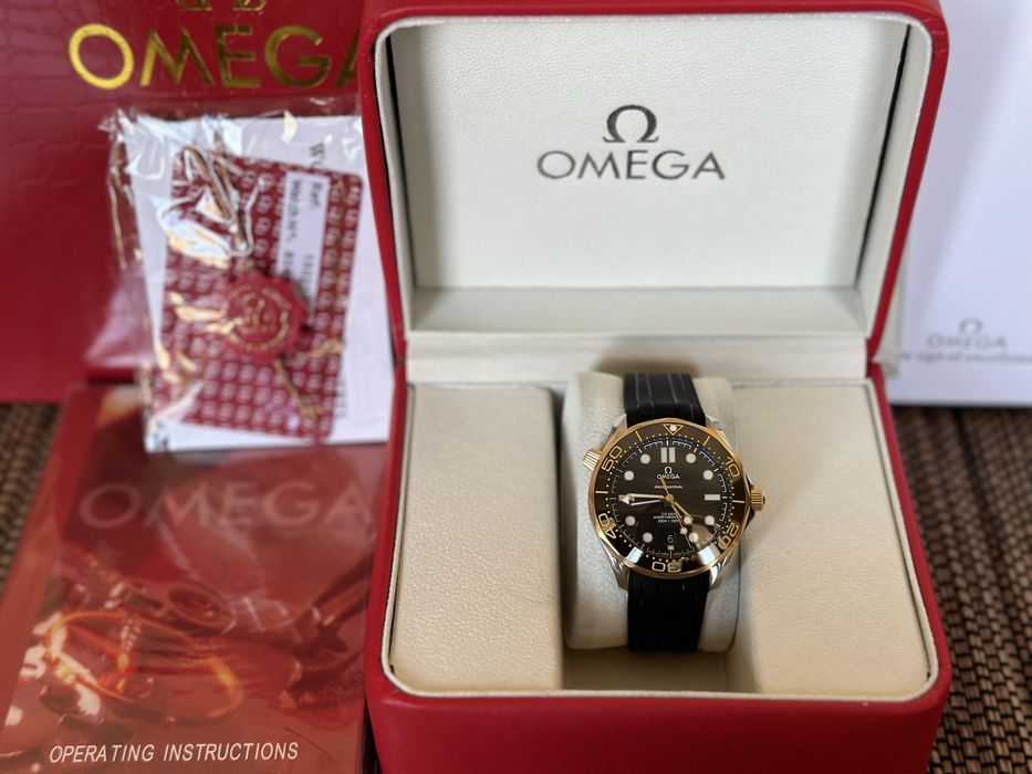 Omega Seamaster Diver 300M Yellow Gold Rubber Strap