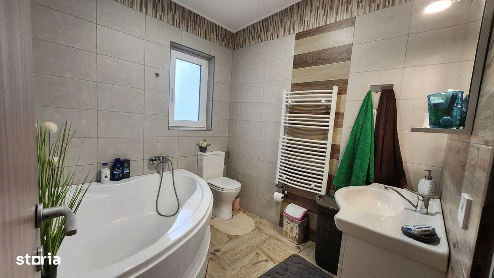 Casa 3 camere,2 bai, 1 garaj,100 mp,315 mp teren,0% comision
