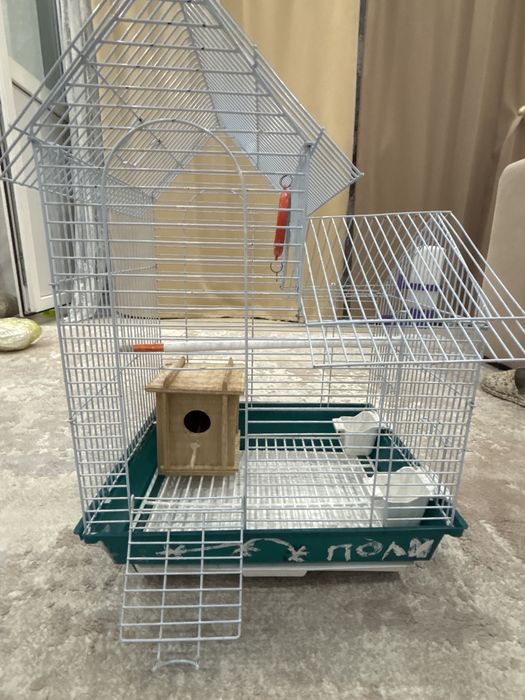Продам клетку для попугаев.