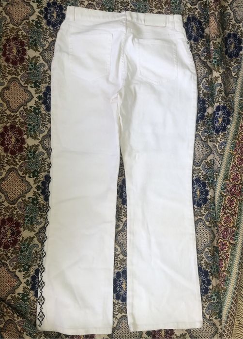 фирменые джинсы с ручной вышивкой из бисера