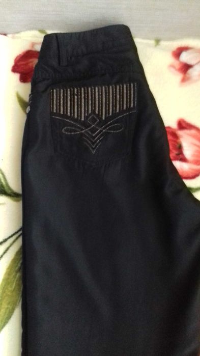 Продам новые болоньевые брюки