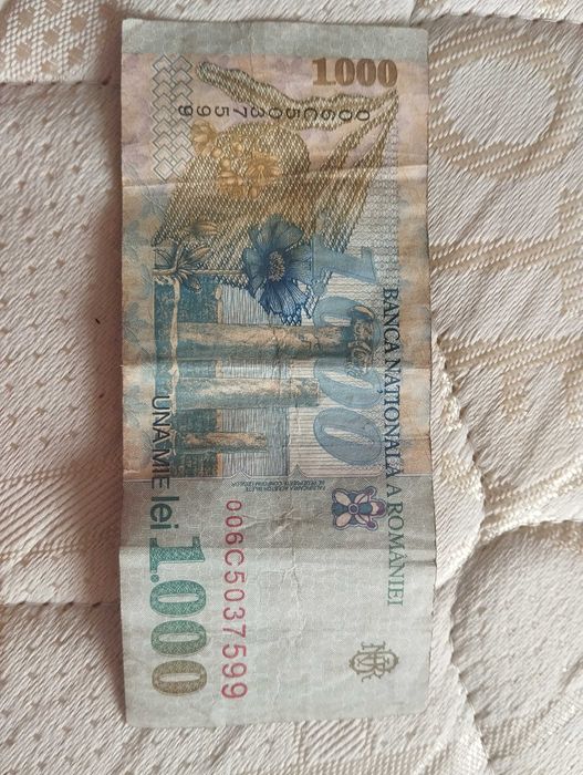 Bancnota una mie lei (bani vechi colecție) este in stare foarte buna