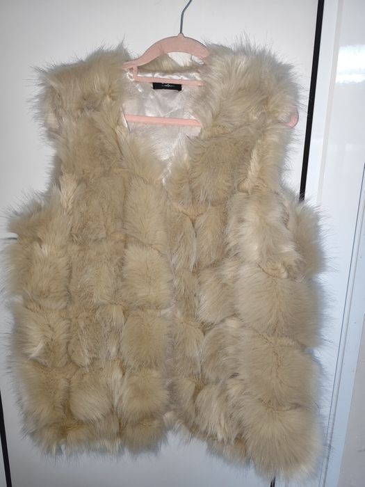 Пухени елеци различни модели