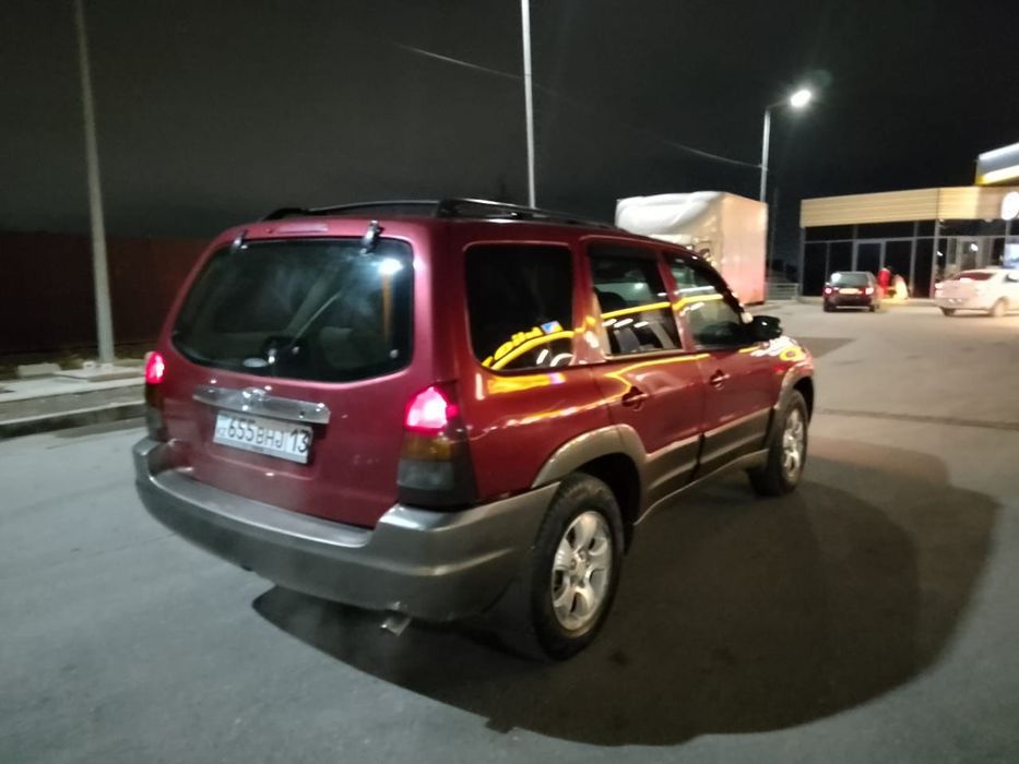 Мазда Tribut 3куб