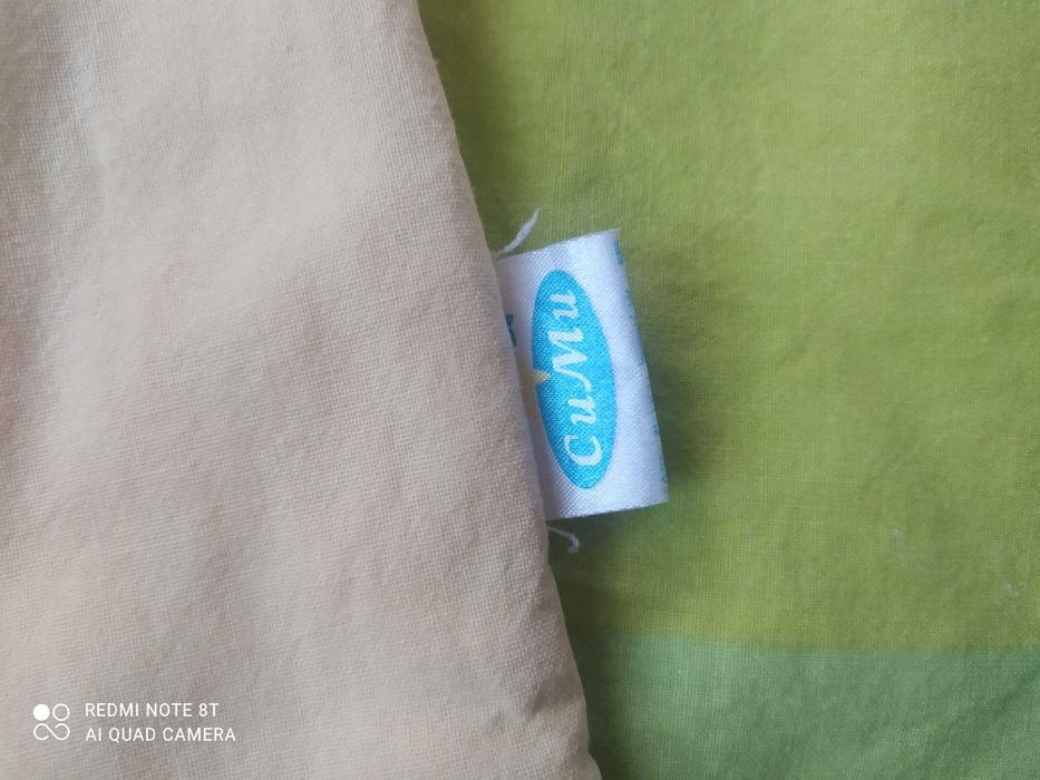 Олекотена завивка за детско легло