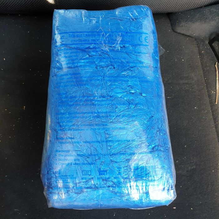 Сини еднократни калцуни - 100 бр. / пакет