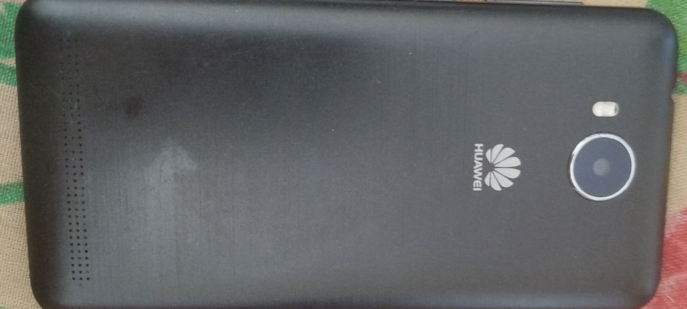 Телефон андроид Хуавей.