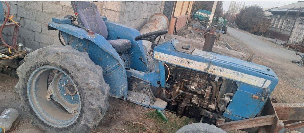 Mini traktor iseki 2540 sotiladi