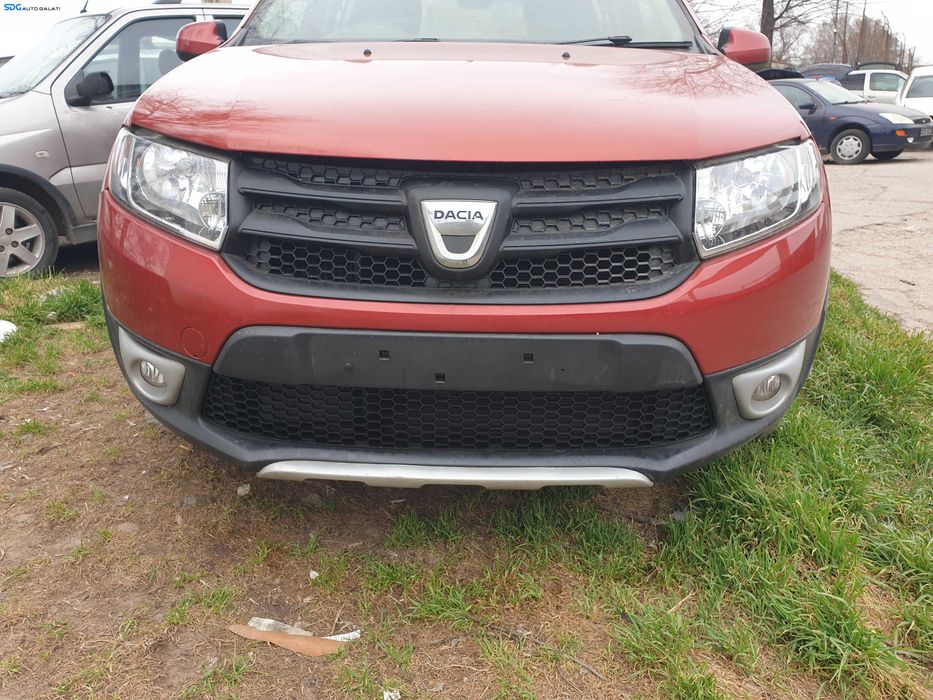 Bara Spoiler Fata Fara Grila cu Emblema Dacia Sandero 2 Stepway 2012 - 2016 Culoare Fire Red Metallic / Pearl TEB76 [K4311]