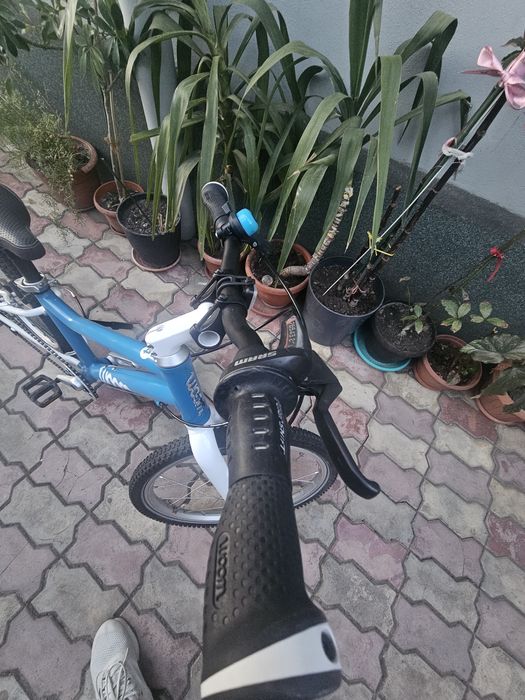Bicicleta Woom 4 în stare perfecta