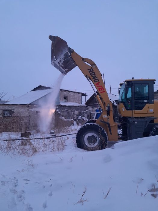 Услуги  прогрузчика ковш 2 куба