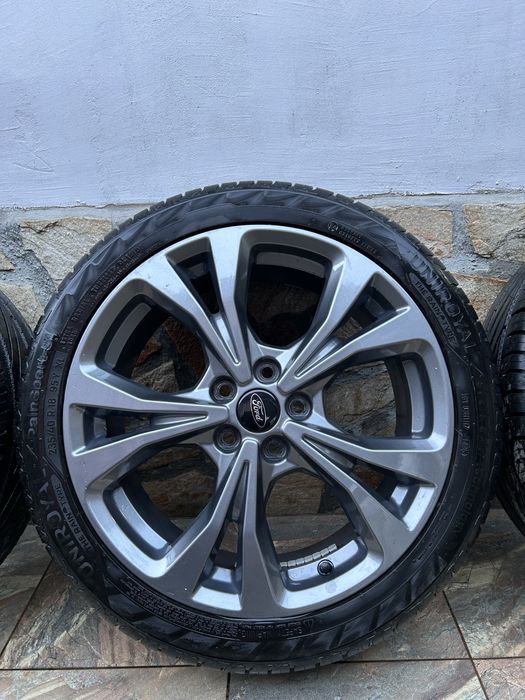 Джанти с гуми 18” 5х108 Titan