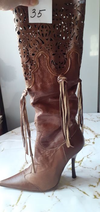 Продам женские сапоги.новые