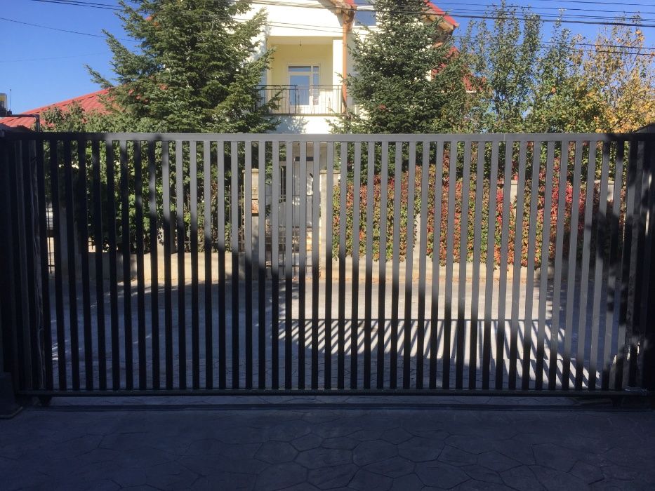 Producem Garduri porti scari pergole structuri metalice spalatorii