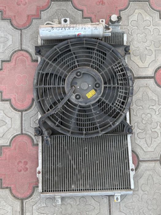 Родиатор на гранту с кондером вместе