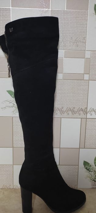 Ботфорты на каблуке