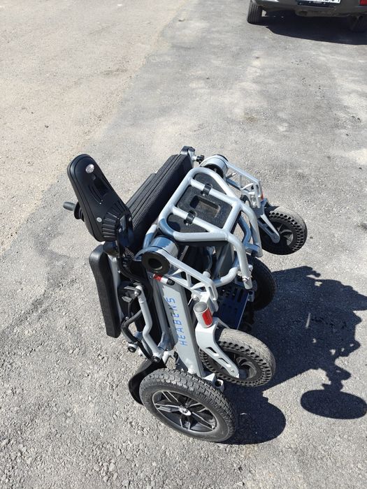 Нвалидная коляска с электроприводом.