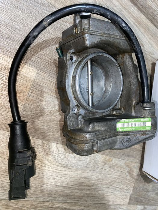 Дроссельная заслонка