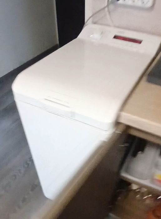 Пералня AEG,горно отваряне